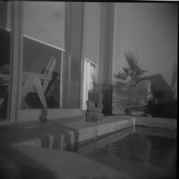 Small photo of Statue on the pool in the room